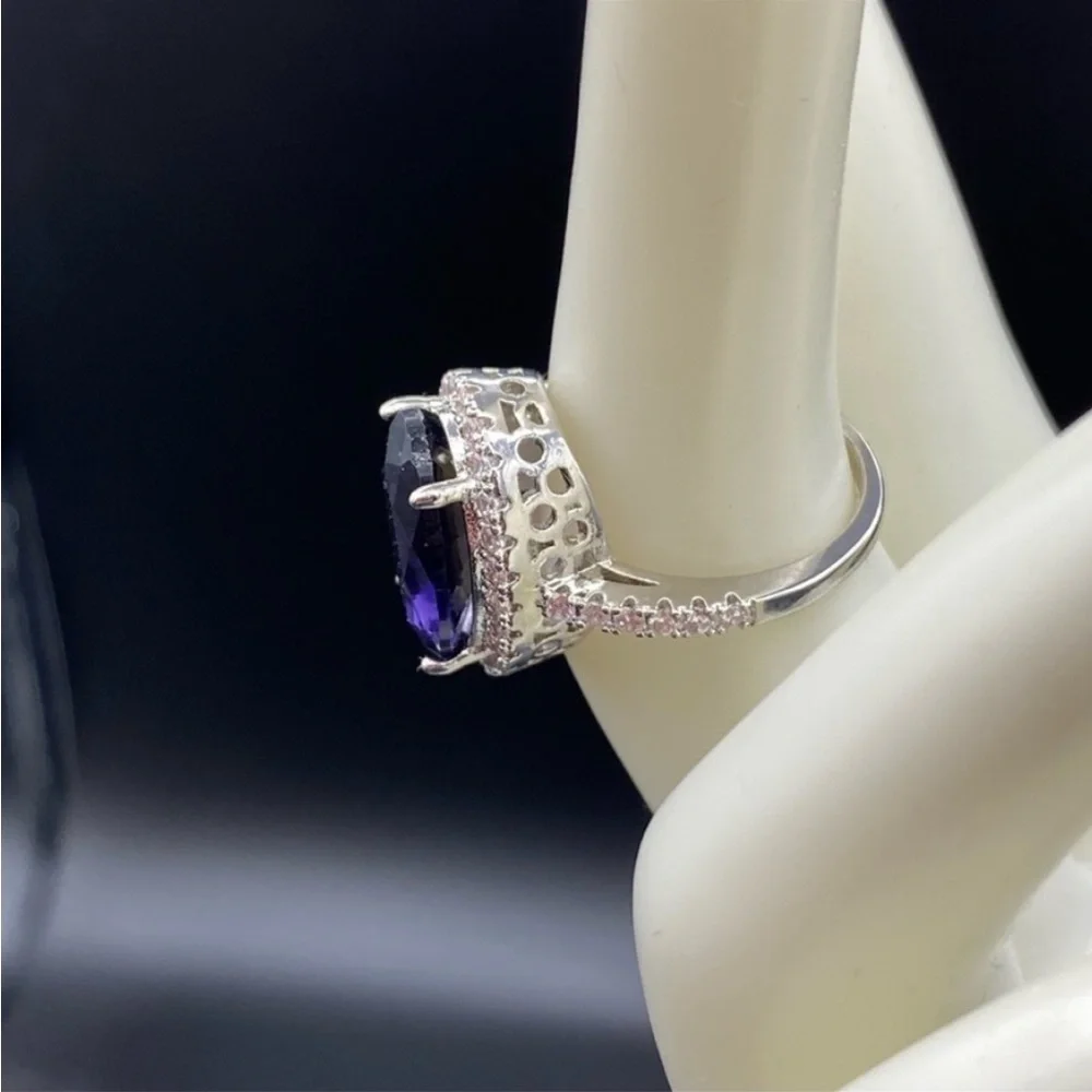 Sterling Silver amethyst prong set cocktail ring with gemstone halo bezel